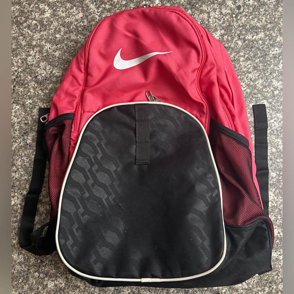 Nike pink and black backpack